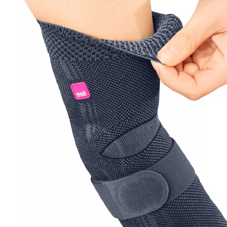 Бандаж ліктьовий з силіконовими вкладками Medi EPICOMED сріблястий