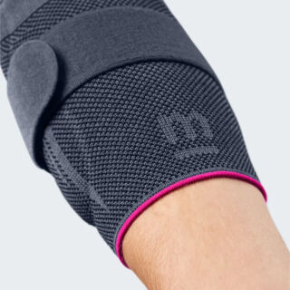 Бандаж ліктьовий з силіконовими вкладками Medi EPICOMED сріблястий